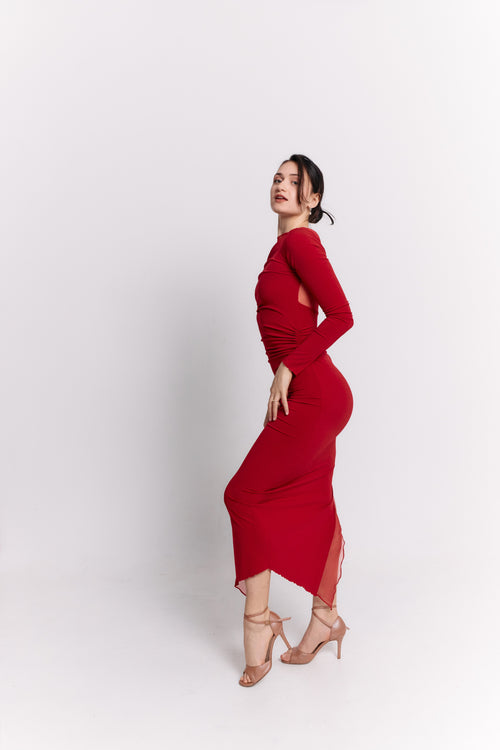 Woman wearing a red dress on a white background