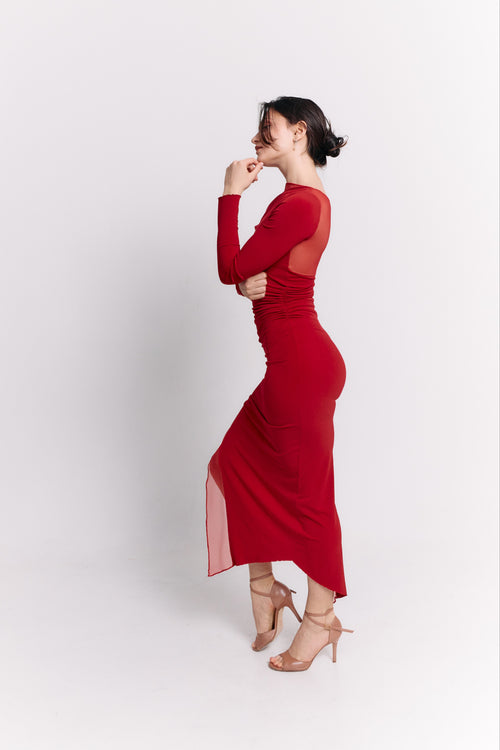 Woman wearing a red dress on a white background